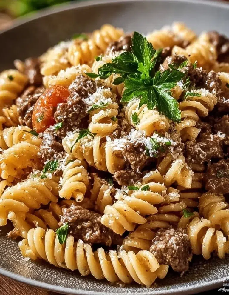 Delicious Beef and Rotini in Garlic Parmesan Sauce served in a bowl